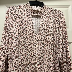 NWOT Torrid textured jersey chocker neck smocked bottom top. Size 0.